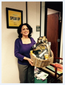 Diane D’Avanzo, Academic Advising Coordinator for the Department of Electrical & Computer Engineering, holding a gift basket