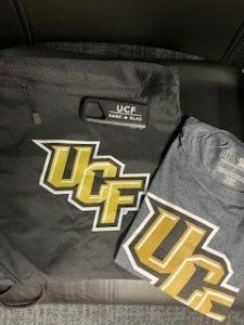 Photo of UCF bag and t-shirt.